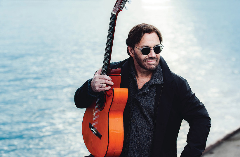  AL DI MEOLA has been playing his guitar across a broad range of styles and genres. (photo credit: Alexander Mertsch)