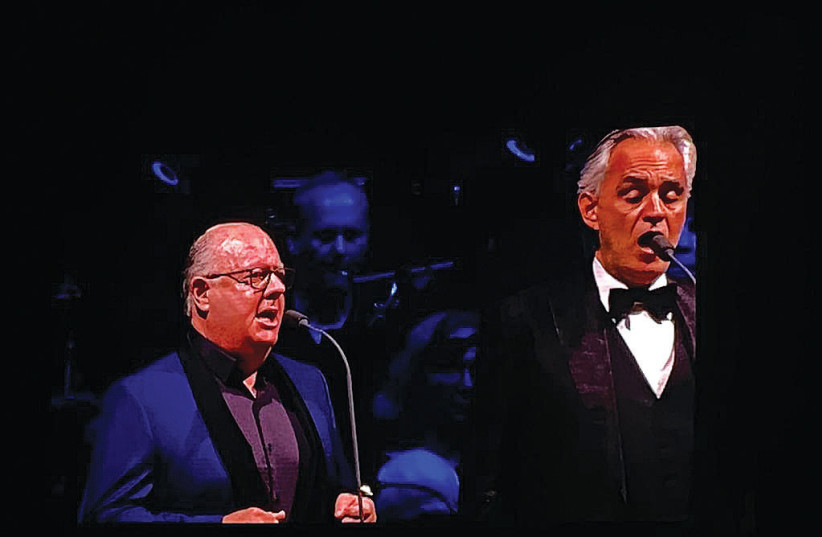  ANDREA BOCELLI sings with Colin Schachat to a packed stadium at Bloomfield on Wednesday night.  (photo credit: STEVE LINDE)