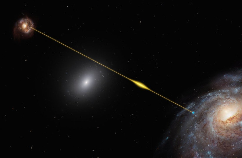  Artist’s impression of a fast radio burst (FRB) traveling through space and reaching Earth. (photo credit: ESO/M. Kornmesser/Flickr)