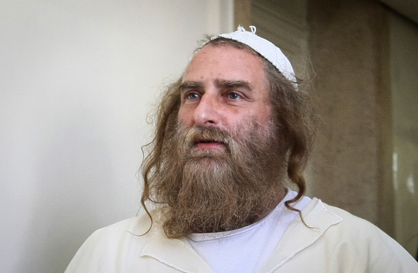  Daniel Ambash, head of a "cult," arrives for a court hearing in Jerusalem, on July 5, 2011.  (photo credit: KOBI GIDEON/FLASH90)