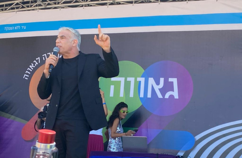  Foreign Minister and Yesh Atid head Yair Lapid at Tel Aviv Pride Parade 2022. (photo credit: AVSHALOM SASSONI/MAARIV)