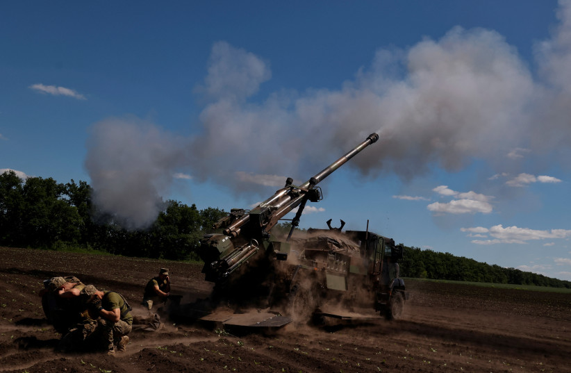 Ukrainian service members fire towards Russian positions with a CAESAR self-propelled howitzer, as Russia's attack on Ukraine continues, in Donetsk Region, Ukraine, June 8, 2022. (photo credit: REUTERS/STRINGER)