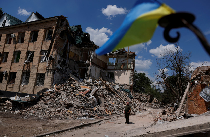 Press officer Olexii Mischenko shows a destroyed city administration building in Bashtanka, Mykolaiv region, as Russia's attack on Ukraine continues, Ukraine, June 9, 2022. (credit: REUTERS/EDGAR SU)