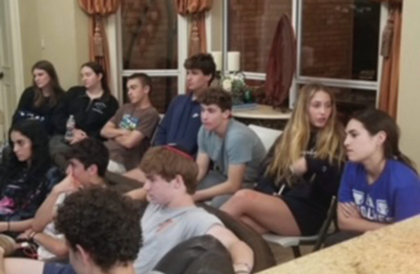  STUDENTS LISTEN to a lecture about antisemitism. Parents were so concerned about what their kids would encounter on campus this fall that they approached the Dallas Area Torah Association.  (credit: RABBI ELI NISSEL)