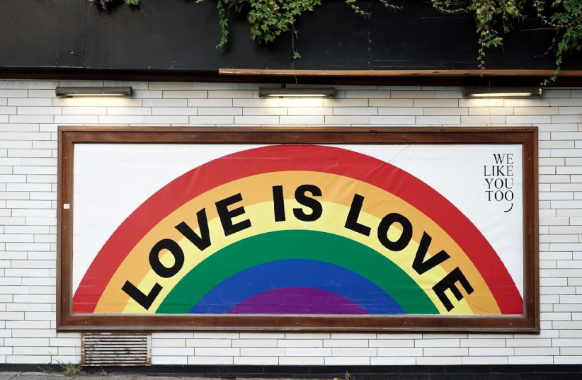  Love is love. One of the Pride month slogans displayed on a train station wall. (photo credit: UNSPLASH)