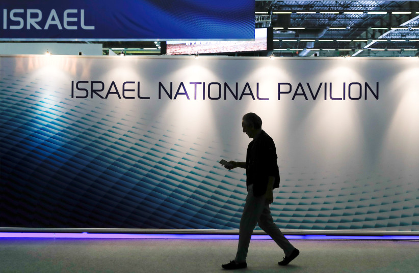  A visitor walks past the Israeli pavilion during the Eurosatory International Defence Exhibition in Villepinte, north of Paris, France June 11, 2018. (credit: Gonzalo Fuentes/Reuters)