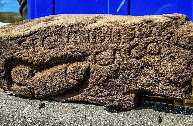  A stone with a carved penis and an explicit insult was recently found at the ruins of a Roman fort near the Scottish-British border along the excavations of Hadrian's Wall, leaving no doubt how one soldier felt about another. (photo credit: THE VINDOLANDA TRUST)
