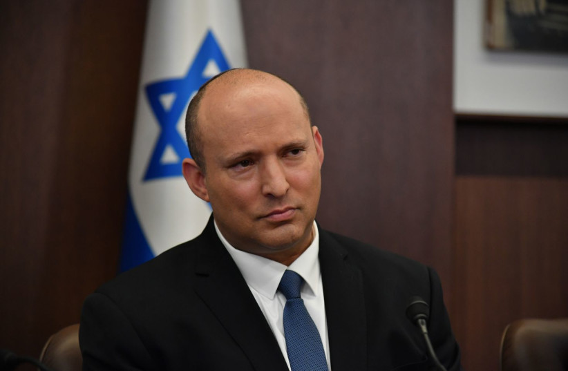  Prime Minister Naftali Bennett at a weekly cabinet meeting, June 12, 2022 (photo credit: Yoav Dudkevitch/Pool)