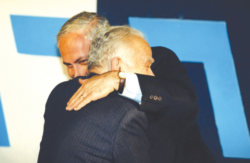  BENJAMIN NETANYAHU hugs former prime minister Yitzhak Shamir after Netanyahu’s victory in the direct election for prime minister in 1996. (photo credit: MOSHE SHAI/FLASH90)