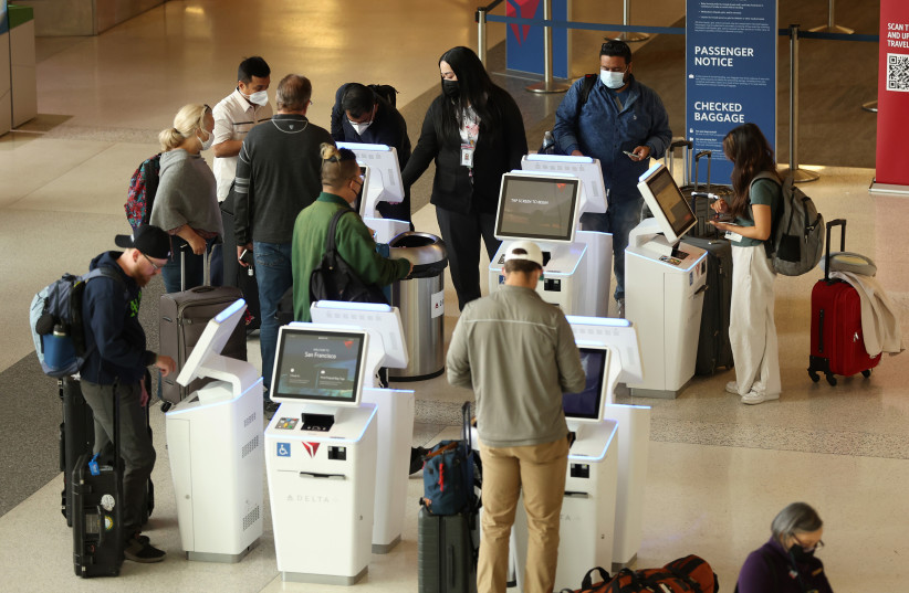 Delta Airlines customers check in for flights at San Francisco International Airport on May 12, 2022, in San Francisco, California. (credit: Justin Sullivan/Getty Images/TNS)