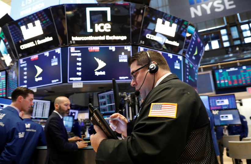  GLOBAL INFLATION currently high: Traders work the floor of the New York Stock Exchange.  (photo credit: REUTERS/BRENDAN MCDERMID)