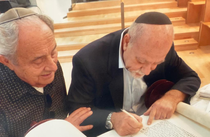  ALEX FOLKMAN (L) at the dedication of a the Sefer Torah at Yad Vashem. R: Rabbi Yitzchak Askof, the sofer. (photo credit: Sharon Folkman)