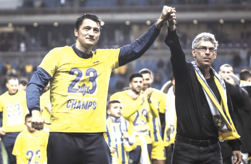   VLADIMIR ‘VLADAN’ IVIC (left) and Mitch Goldhar (right) hope to replicate their past success together at Maccabi Tel Aviv, with the Canadian owner excited to bring back the Serbian coach to lead the yellow-and-blue again. (photo credit: MACCABI TEL AVIV/COURTESY)