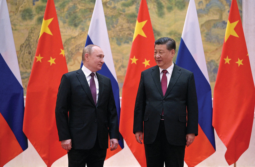 CHINESE PRESIDENT Xi Jinping hosts Russian President Vladimir Putin in Beijing in February.  (photo credit: Sputnik/Aleksey Druzhinin/Kremlin via Reuters)