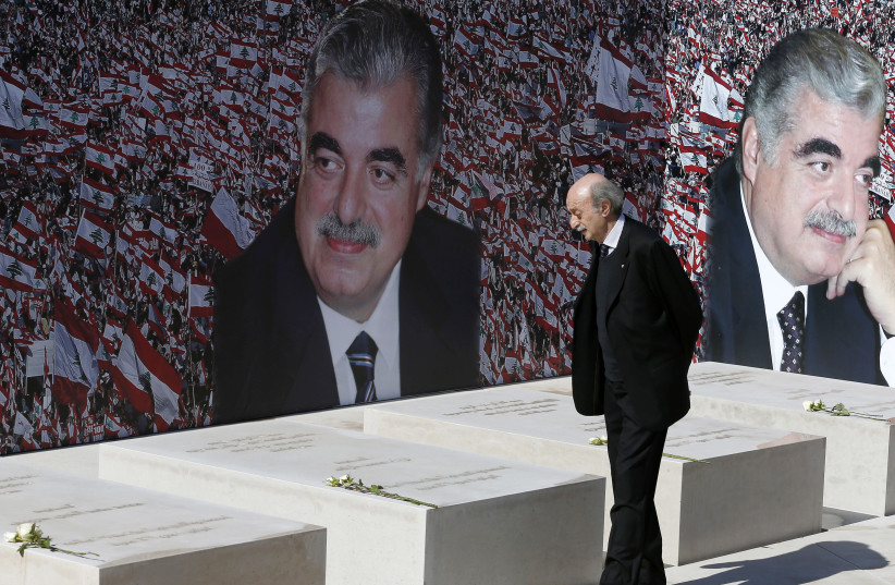  Lebanon's Druze leader Walid Jumblatt pays his respects at the grave of former Prime Minister Rafik al-Hariri, to mark the 10th anniversary of al-Hariri's assassination, in downtown Beirut, February 14, 2015. (credit: JAMAL SAIDI/ REUTERS)