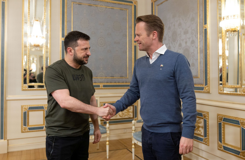  Ukraine's President Volodymyr Zelenskiy welcomes Denmark's Minister of Foreign Affairs Jeppe Kofod before a meeting, as Russia's invasion of Ukraine continues, in Kyiv, Ukraine May 2, 2022 (credit: VIA REUTERS)