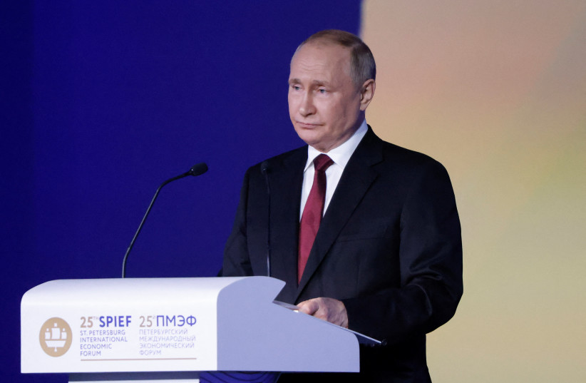  Russian President Vladimir Putin delivers a speech during a session of the St. Petersburg International Economic Forum (SPIEF) in Saint Petersburg, Russia June 17, 2022 (photo credit: REUTERS/MAXIM SHEMETOV)