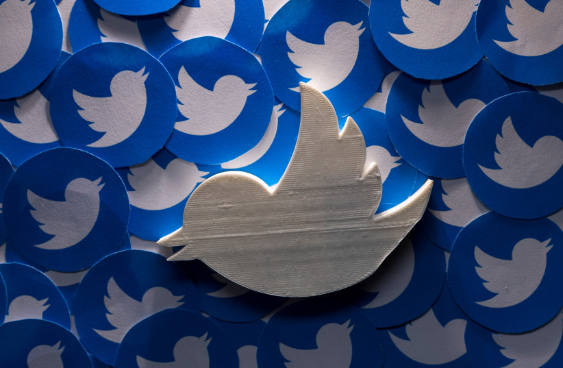  A 3D-printed Twitter logo on non-3D printed Twitter logos is seen in this picture illustration taken April 28, 2022 (credit: REUTERS/DADO RUVIC)