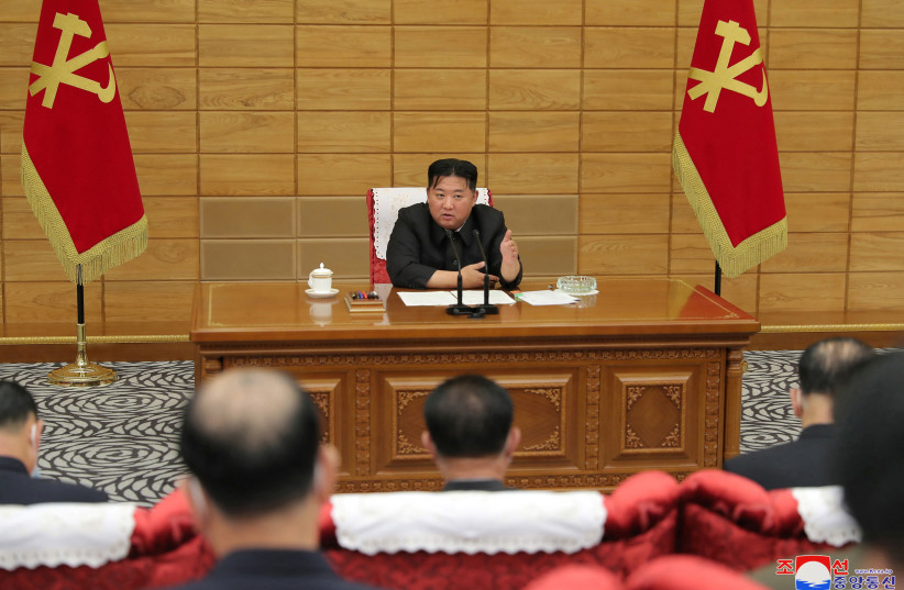  North Korean leader Kim Jong Un speaks at a politburo meeting of the Worker's Party on the country's coronavirus disease (COVID-19) outbreak response in this undated photo released by North Korea's Korean Central News Agency (KCNA) on May 21, 2022.  (photo credit: KCNA VIA REUTERS)