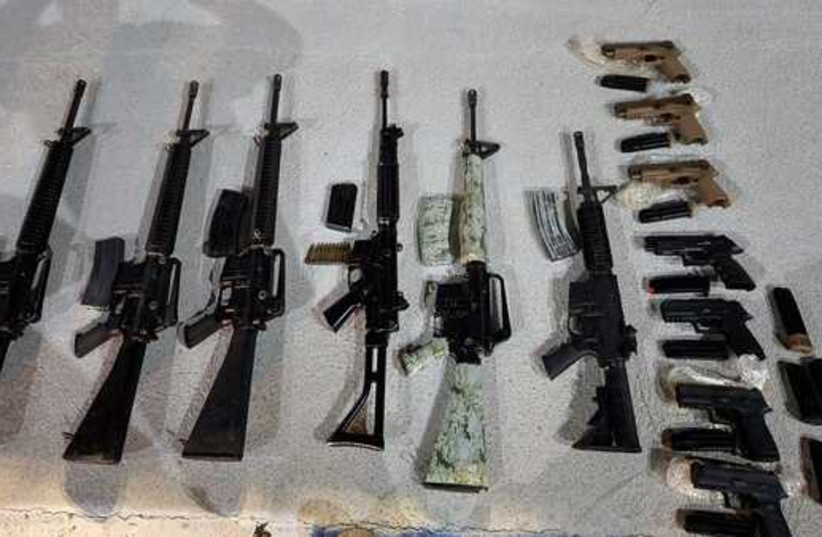  Guns confiscated during smuggle attempt from Jordan into Israel. (photo credit: IDF SPOKESPERSON'S UNIT)