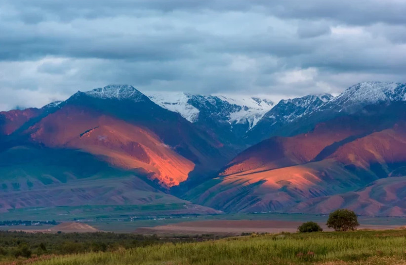  View of the Tian Shan mountains. Studying ancient plague genomes,  researchers traced the origins of the Black Death to Central Asia, close to Lake Issyk Kul, in what is now Kyrgyzstan. (credit: Lyazzat Musralina)