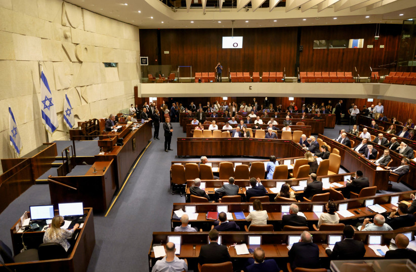  A general view shows a session at the Israeli parliament, the Knesset, for the preliminary reading of a bill to dissolve the parliament, in Jerusalem, June 22, 2022.  (credit: RONEN ZVULUN/REUTERS)