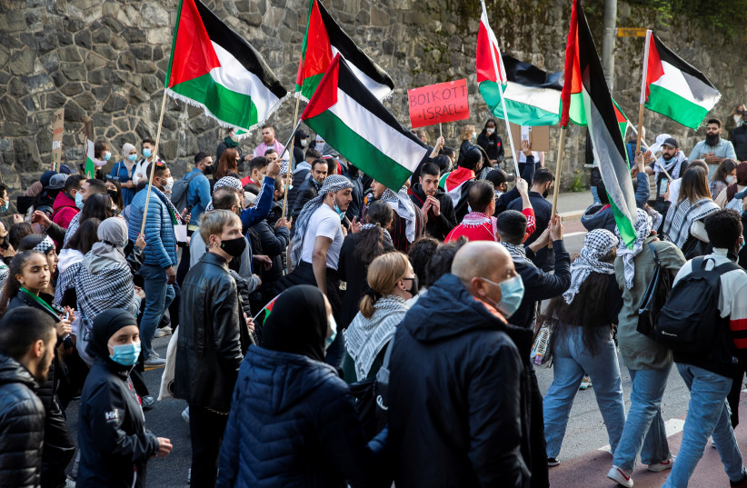  People attend a demonstration in support of Palestine in Oslo, Norway May 19, 2021 (photo credit: Berit Roald/NTB/via REUTERS )