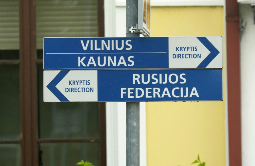  Direction signs are seen in the border railway station in Kybartai, Lithuania June 21, 2022. (credit: Ints Kalnins/Reuters)