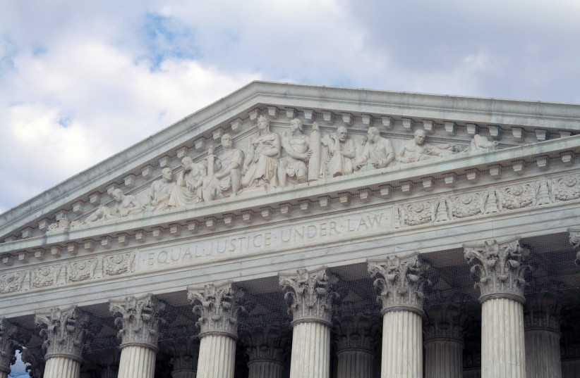  The inscription on the Supreme Court building reads "equal justice under law."  (photo credit: JENS GRABENSTEIN/FLICKR COMMONS)