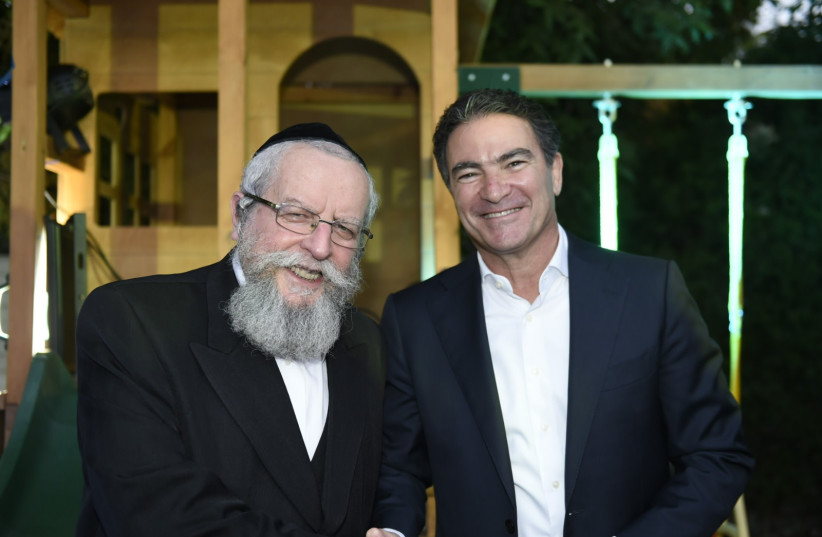  Rabbi Firer, and Yossi Cohen, former head of the Mossad. (photo credit: MORAG BITAN)