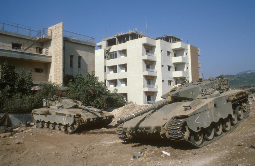  IDF TANKS park near houses in Tyre, South Lebanon, July 1982.  (photo credit: YOSSI ZAMIR/FLASH90)