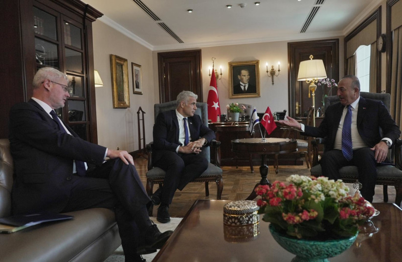   Foreign Minister Yair Lapid meets with Turkish Foreign Minister Mevlut Cavusoglu (photo credit: BOAZ OPPENHEIM/GPO)