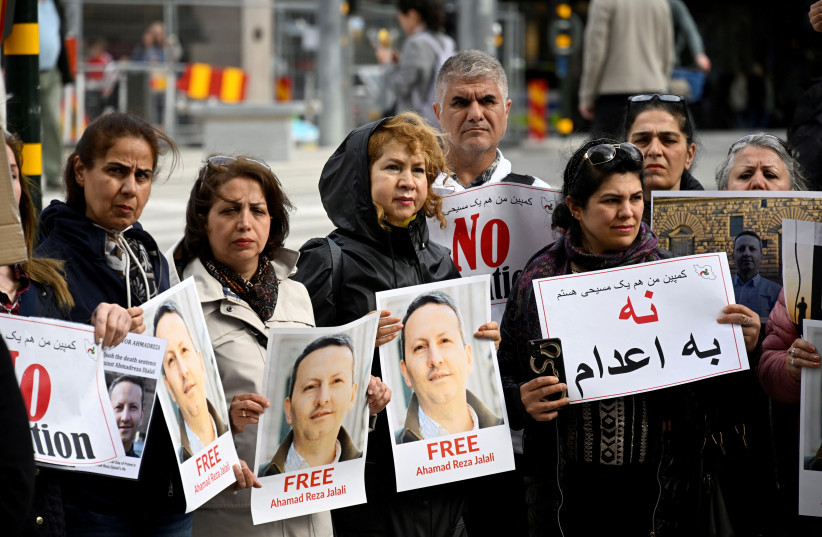 A demonstration supporting the Swedish-Iranian doctor and researcher Ahmadreza Djalali, who is imprisoned and sentenced to death in Iran, was held in Stockholm, Sweden, May 14, 2022. (photo credit: ANDERS WIKLUND/TT NEWS AGENCY/VIA REUTERS)