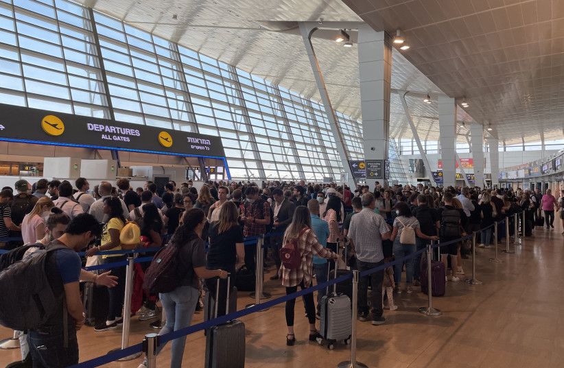  Passengers at Ben Gurion wait in long lines to go through security.  (credit: ALDEN TABAC)