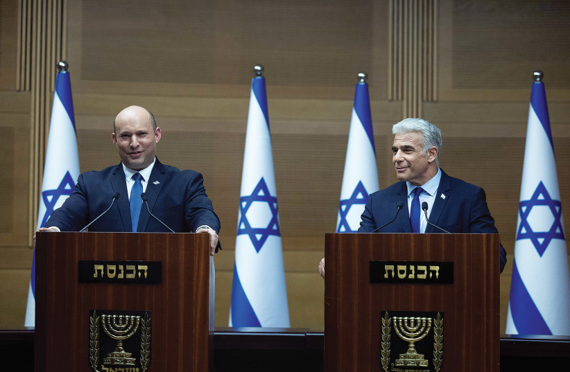  PRIME MINISTER Naftali Bennett and Foreign Minister Yair Lapid hold a joint press conference in the Knesset on Monday. (photo credit: YONATAN SINDEL/FLASH90)