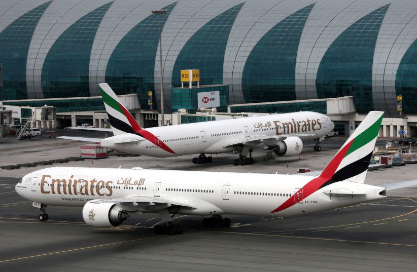 Emirates Airline Boeing 777-300ER planes are seen at Dubai International Airport in Dubai, United Arab Emirates, February 15, 2019. (photo credit: REUTERS/CHRISTOPHER PIKE/FILE PHOTO)