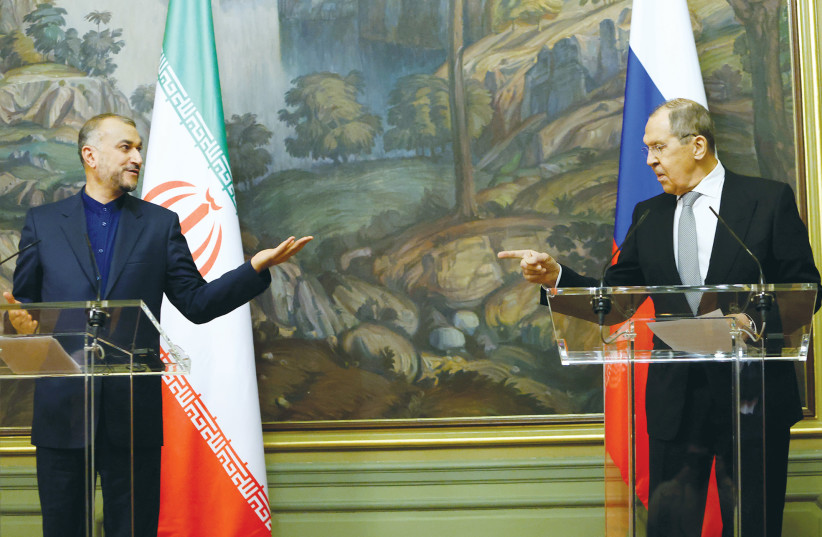  RUSSIAN FOREIGN MINISTER Sergei Lavrov (right) and his Iranian counterpart Hossein Amir-Abdollahian meet in Moscow, in March. Throughout modern history, Iran has followed in Russia’s footsteps in adopting almost identical approaches to politics, says the writer.  (photo credit: MAXIM SHEMETOV/REUTERS)