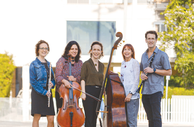  VOICE OF Music artistic director Ofra Yitzhaki (center) with some of her instrumentalists.  (credit: MICHAEL FABIA)