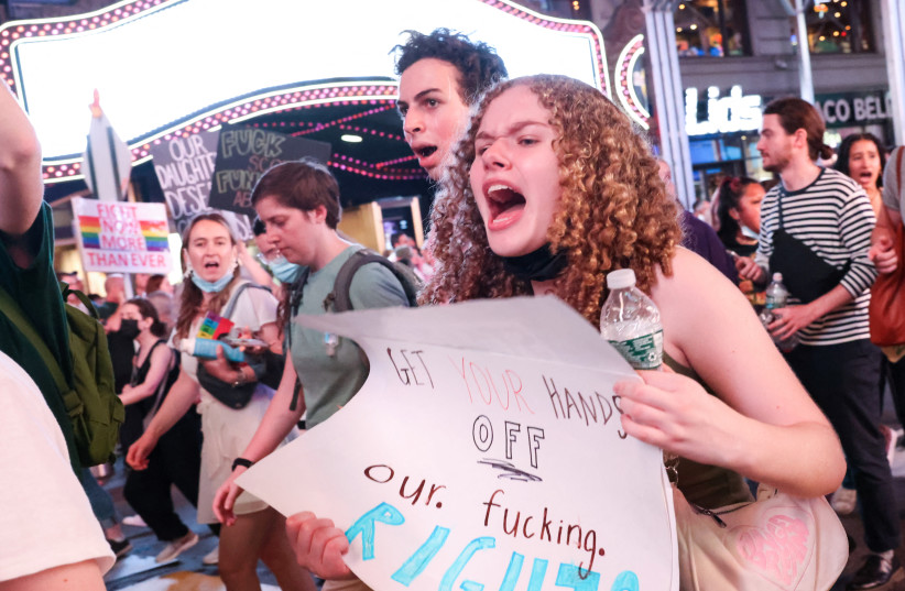  People protest the Supreme Court decision to overturn Roe v Wade abortion decision in New York City, New York, US, June 24, 2022. (photo credit: REUTERS/CAITLIN OCHS)