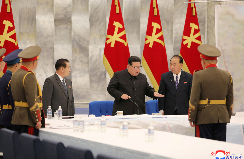  North Korean leader Kim Jong Un attends a convocation of the Expansion of the Central Military Commission of the Workers' Party of Korea in this photo released by the country's Korean Central News Agency (KCNA) June 23, 2022 (photo credit: KCNA VIA REUTERS)