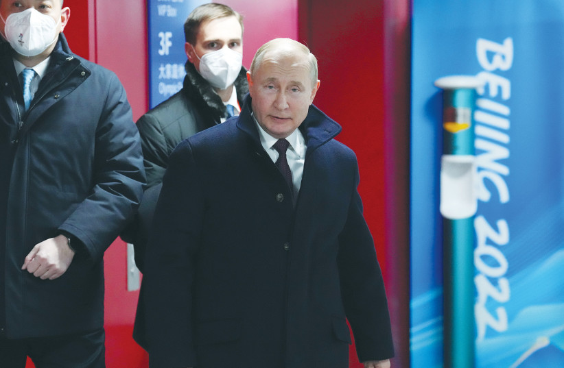  RUSSIAN PRESIDENT Vladimir Putin arrives at the opening ceremony of the Beijing Olympics, in February.  (credit: CARL COURT/REUTERS)