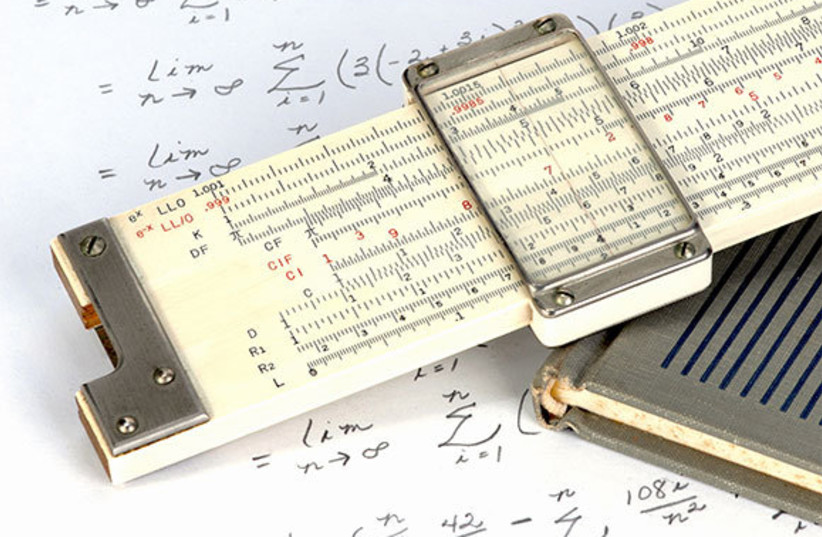 The device became increasingly sophisticated. A slide rule with different scales. The thin line that can be moved along the rule allows for convenient and accurate reading of the calculation results (credit: dvande/SHUTTERSTOCK)