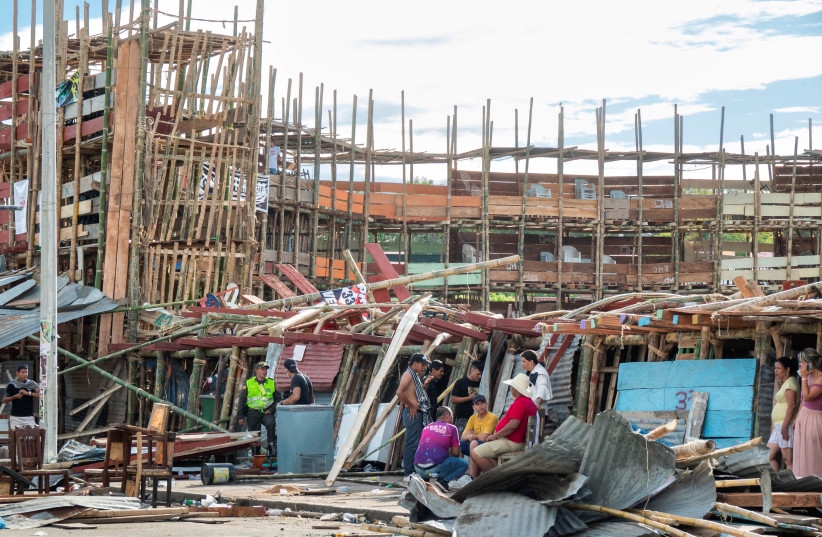  Debris is seen after part of a grandstand collapsed in a bullring, during the celebration of the San Pedro festivities in El Espinal, Colombia June 26, 2022. (photo credit: REUTERS/CRISTIAN PARRA)