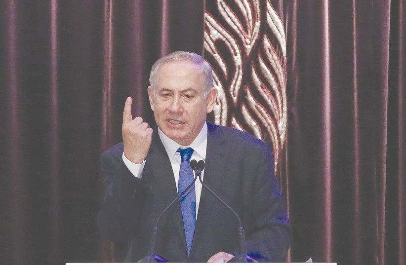  THEN-PRIME MINISTER Benjamin Netanyahu speaks at the Central Synagogue in Sydney, February 2017. (photo credit: MARK METCALFE/REUTERS)
