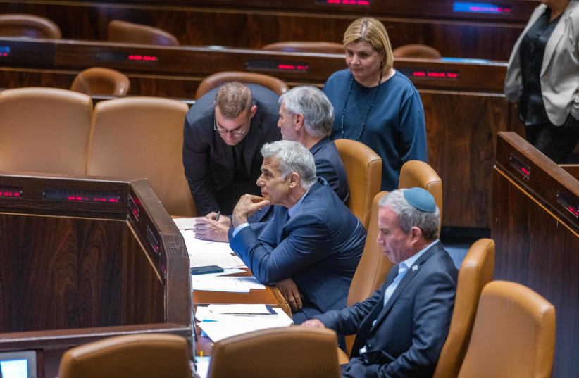  Foreign Minister Yair Lapid during a discussion and a vote on a bill to dissolve the Knesset, at the assembly hall of the Israeli parliament, in Jerusalem, on June 27, 2022 (photo credit: OLIVIER FITOUSSI/FLASH90)
