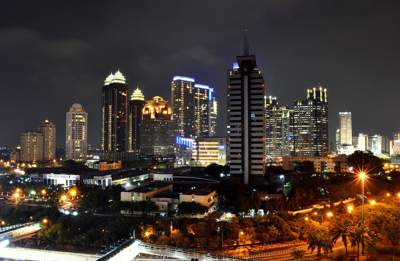  Indonesia's capital city, Jakarta, is seen at night (illustrative). (photo credit: Wikimedia Commons)