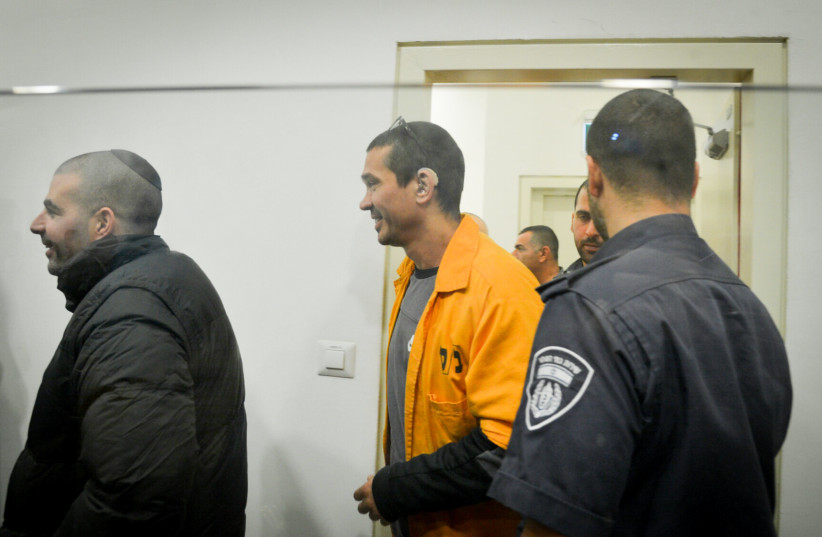  Yitzhak Abergil, of the Abergil crime family, arrives at the Tel Aviv District Court on February 5, 2017, as part of Case 512, targeting members of Israel's biggest criminal organization and its affiliate organizations.  (credit: FLASH90)