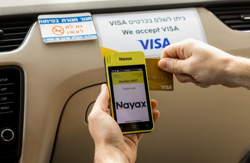  Collabortion between Visa and Nayax has many taxis in Israel to accept payments without cash. (photo credit: NIR SLAKMAN)