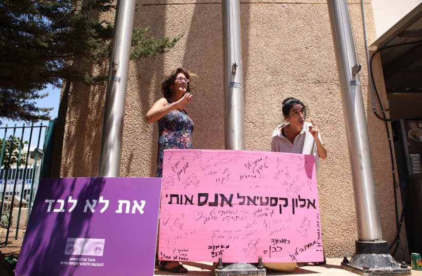  Protesters outside the Talmon Prison where Real estate promoter Alon Kastiel is being early released. Kastiel had been charged with sexual harrassment and rape, after 12 complaints by different women. June 27, 2022.  (photo credit: David Cohen/Flash90)