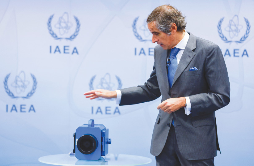  A SURVEILLANCE camera is displayed by IAEA Director-General Rafael Mariano Grossi at a news conference in Vienna, earlier this month. Grossi warned that it would be fatal to the Iran nuclear deal if Tehran didn’t reinstall cameras used by the IAEA to monitor nuclear acticvity.  (photo credit: REUTERS)
